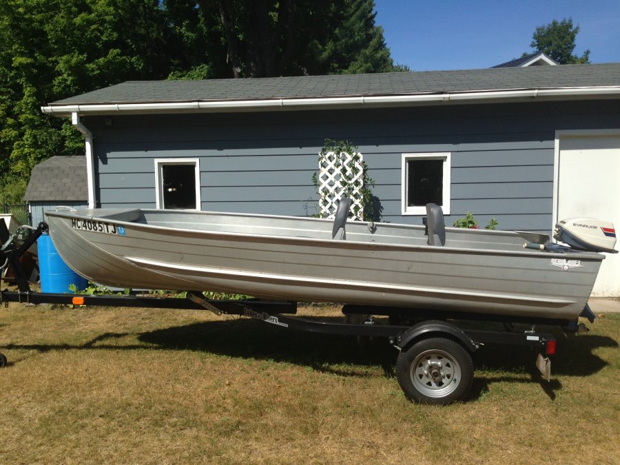 14ft. aluminum boat, 6 horse power motor, and trailer. Few accessories ...
